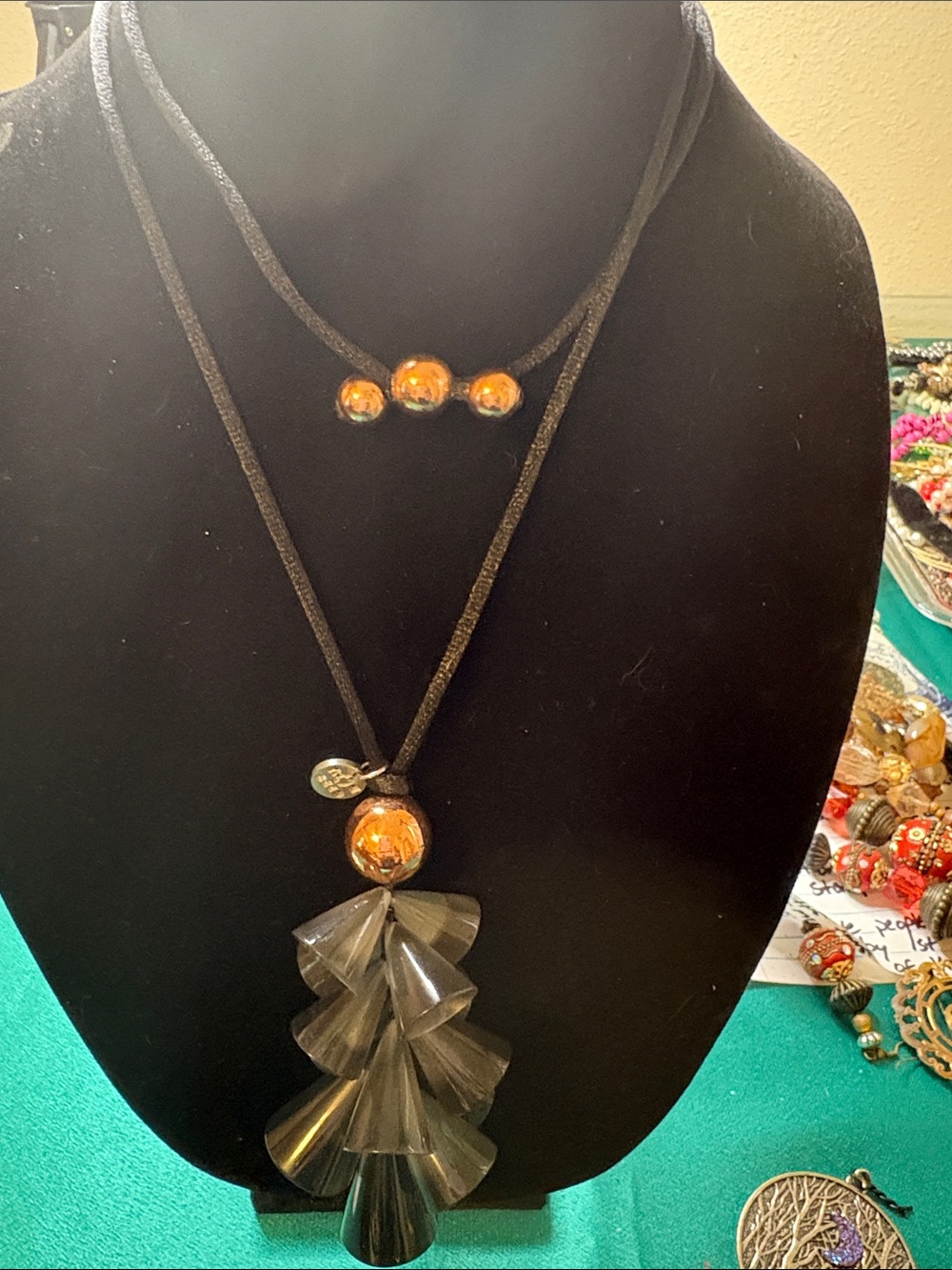 Now Ecco unique plastic/ acrylic grey cone spheres with copper beads